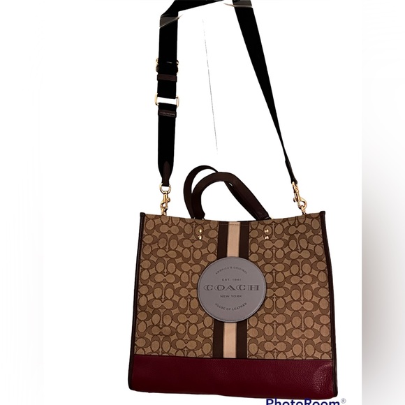 Coach Handbags - NEW Coach Tote Bag with Coach Symbol on the front. 4 compartments inside.